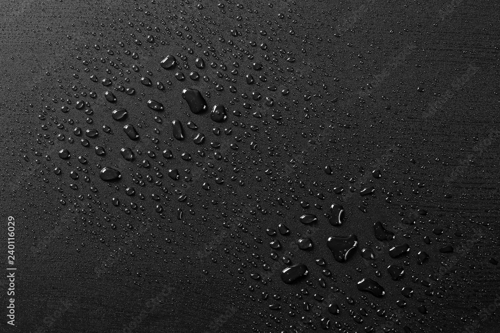 Water droplets on black background - Image texture - obrazy, fototapety, plakaty 