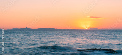 warm summer sunset at the sea
