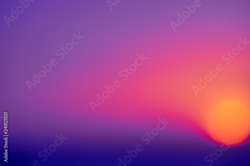 Spectacular sunset on the tropical ocean beach. Blurred.us background.