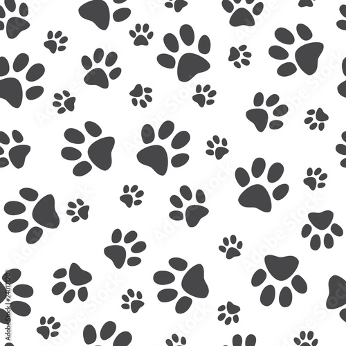 Vector illustration animal paw track seamless pattern - backdrop with monochrome silhouettes of cat or dog footprint. Cute texture of black print of kitten or puppy trace shapes.