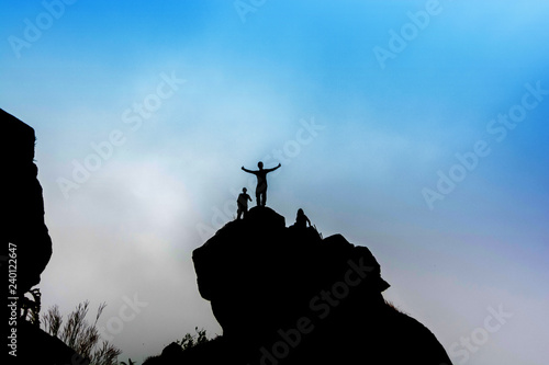silhouette of tourist group on high cliff rock in mon jong doi at Chaing mai  Thailand