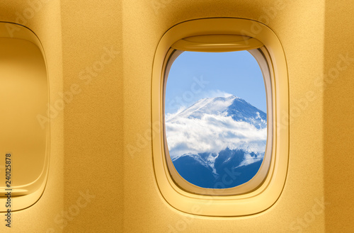 Fuji mountain in the aircraft's porthole © kwanchaichaiudom
