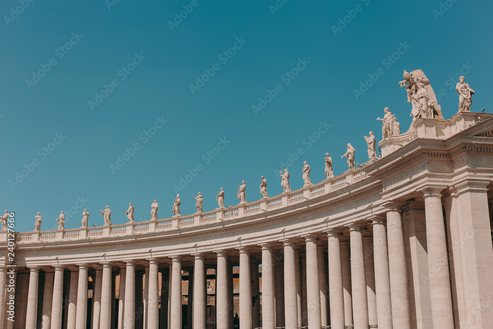 St. Peter's Square in the Vatican on a sunny day. Architecture and many chairs