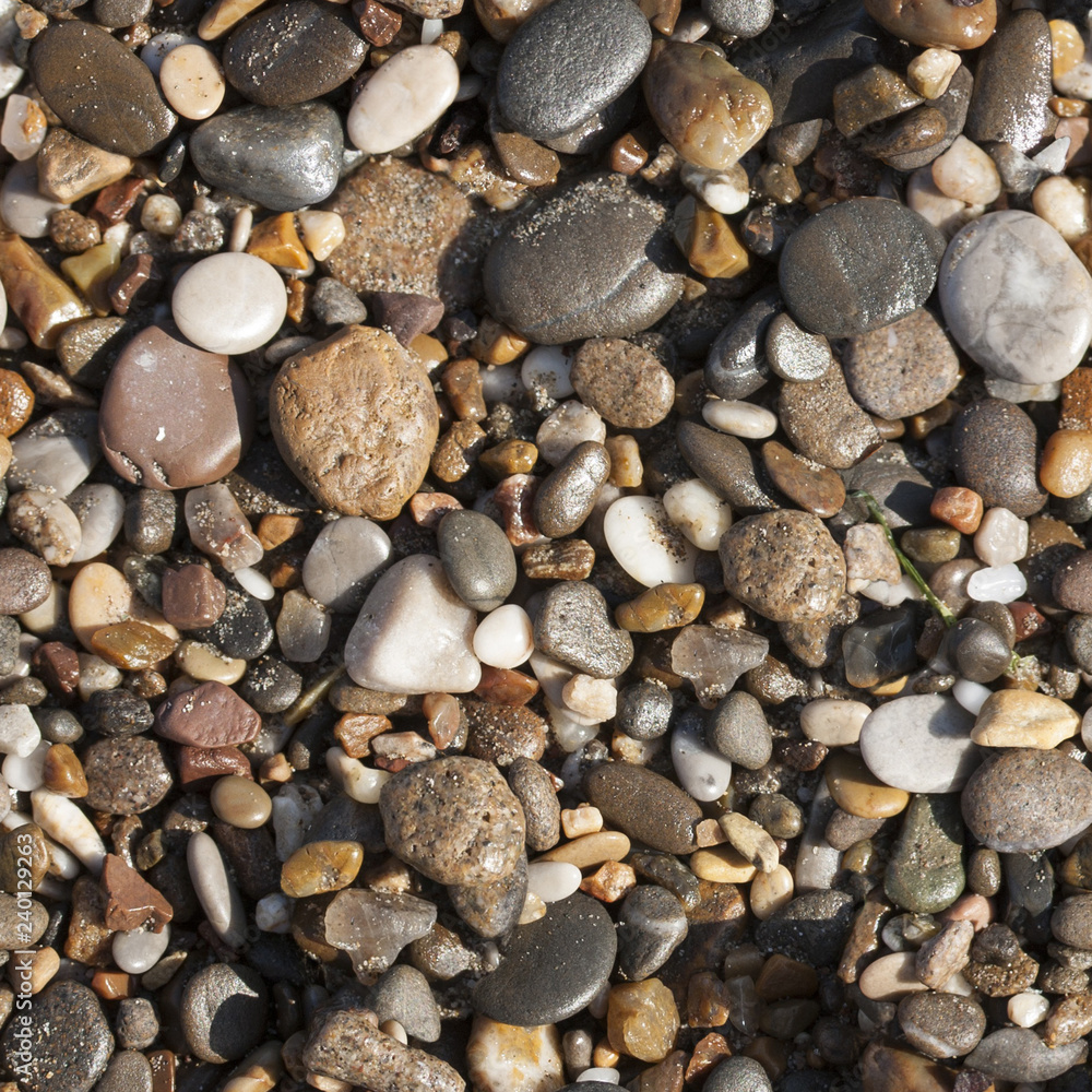 Naklejka premium Seamless texture of stones of different sizes