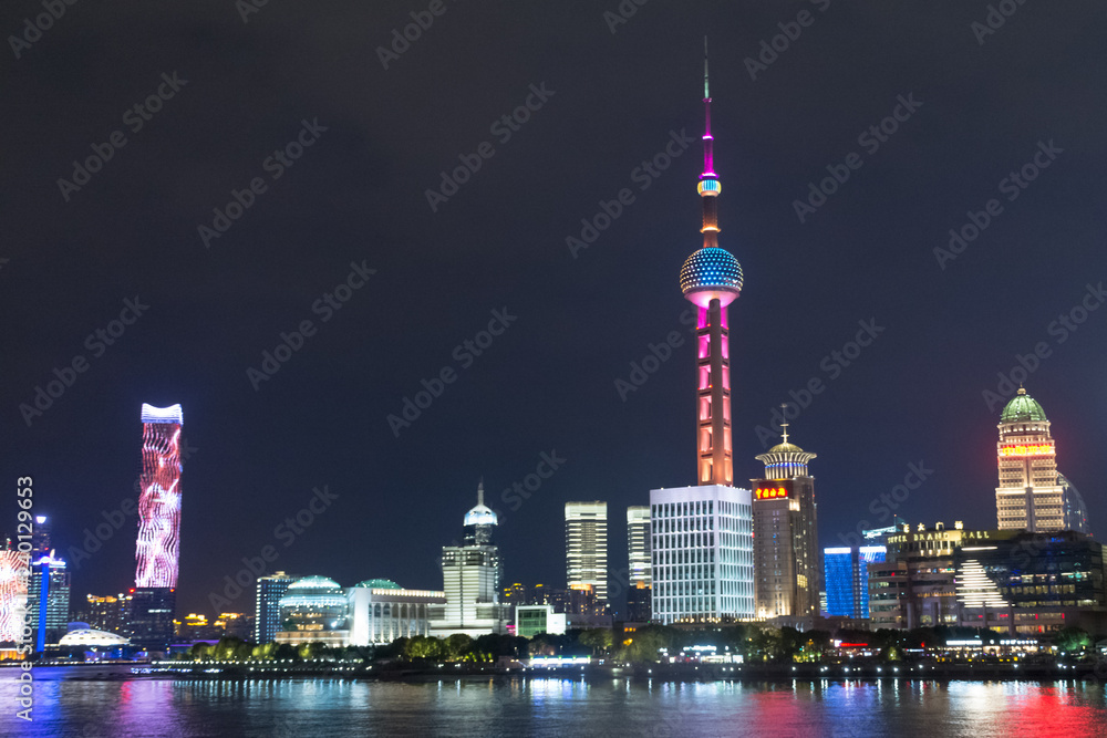 Shanghai. The tower is the Pearl of the East and skyscrapers of Pudong district.