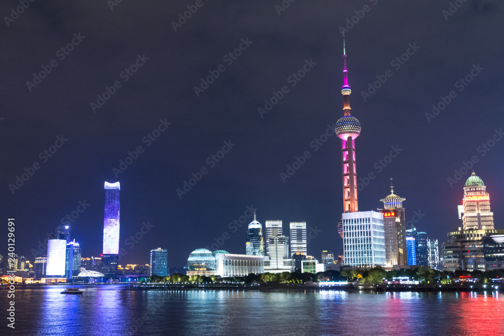 Shanghai. The tower is the Pearl of the East and skyscrapers of Pudong district.