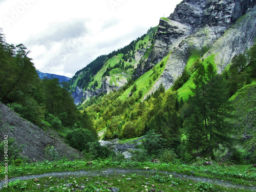 Mountains and rocks in the valley Weisstannenthal - Canton of St. Gallen, Switzerland photo