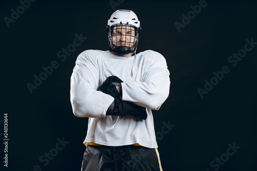Photography Portrait of confident brave positive rugby player in full sport outfit standing