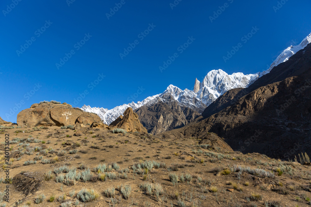 Fototapeta premium Landscape of snow capped mountain range. A view from the glacier, Babusar Pass, Khyber Pakhtunkhwa, Gilgit Baltistan, Northern Pakistan.