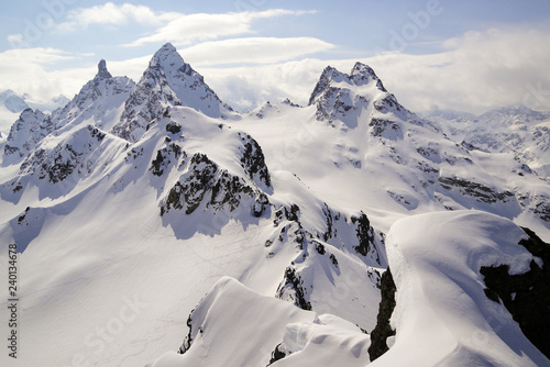 winter mountain landscape in the Swiss Alps above Klosters with the Gross Litzner and Gross Seehorn mountain peaks photo