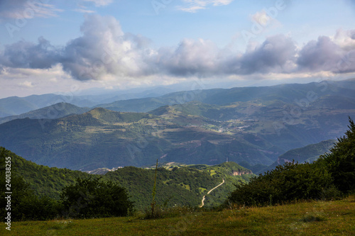 landscape with mountains and clouds