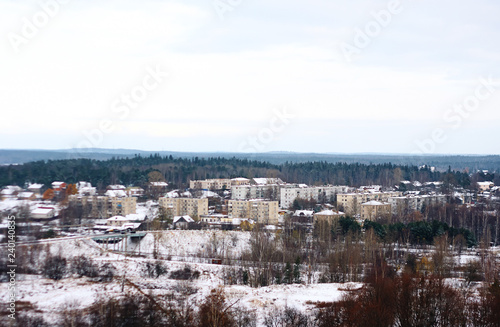 a quiet, nondescript town in the middle of the forest in winter