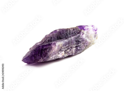 Beautiful natural raw amethyst crystal on white background isolated