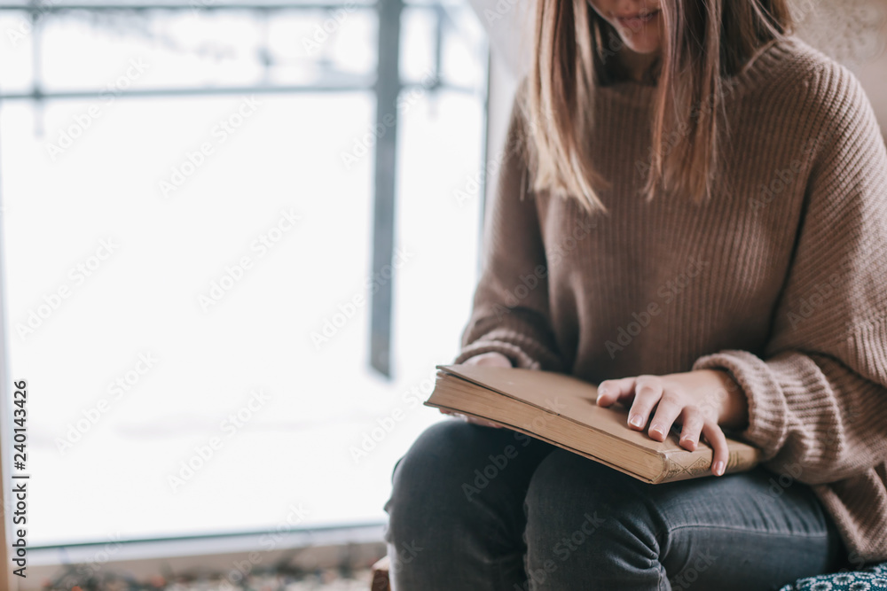 Girl relaxing and reading book Girl relaxing and reading book