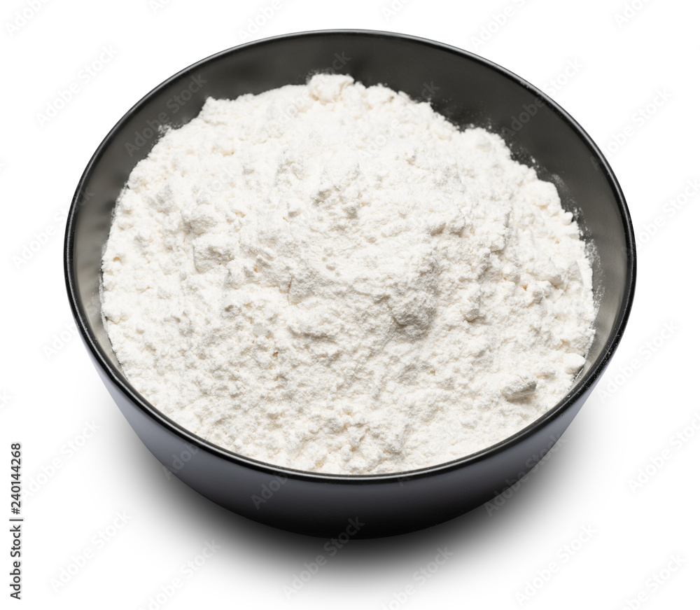 bowl of wheat flour isolated on white