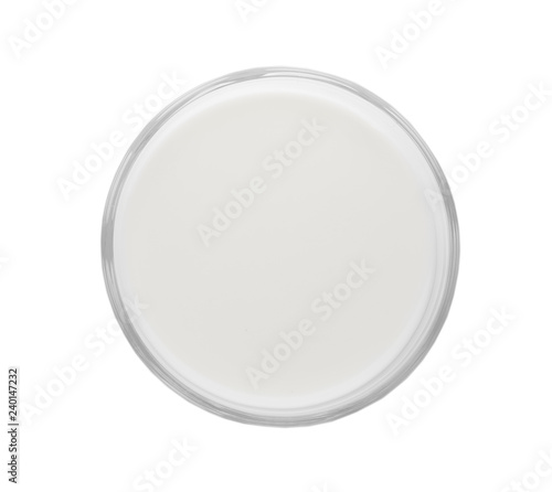 Glass with fresh milk isolated on white, top view