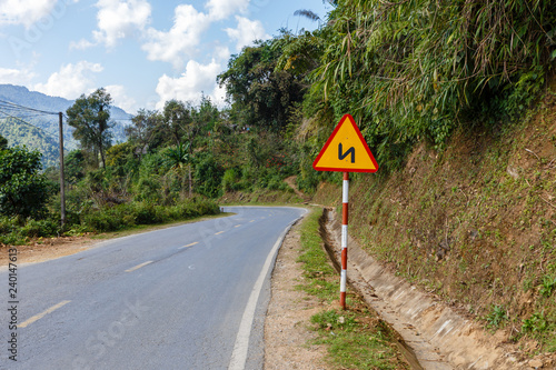 sign winding road on a mountain road Vietnam, Traffic Sign