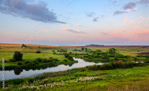 Tranquil summer landscape with river bend.