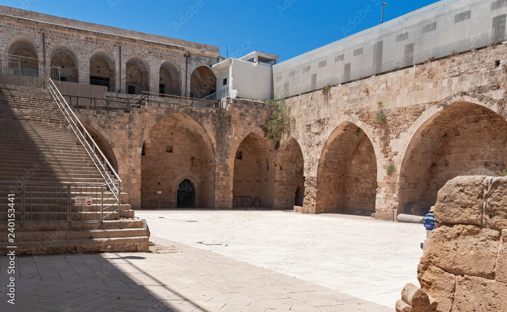 a partial view of the courtyard of the akko acre crusader fortress in the old city of acre in Israel