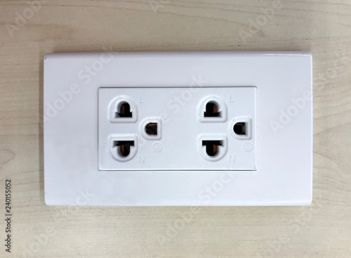 closeup electric socket on wooden table