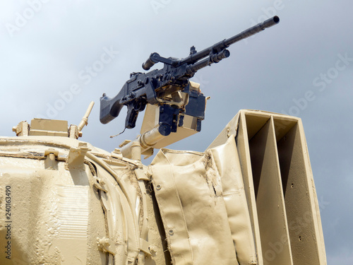 Fragment of the battle tank. Machine gun. Weapon