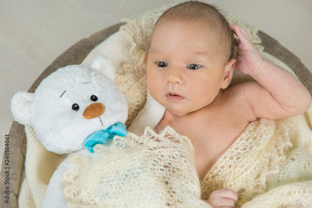 sleeping newborn baby on a blanket with a teddy sleeping newborn baby on a blanket with a teddy