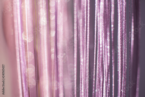 Purple-pink background with glitter at at dawn the sun. Background