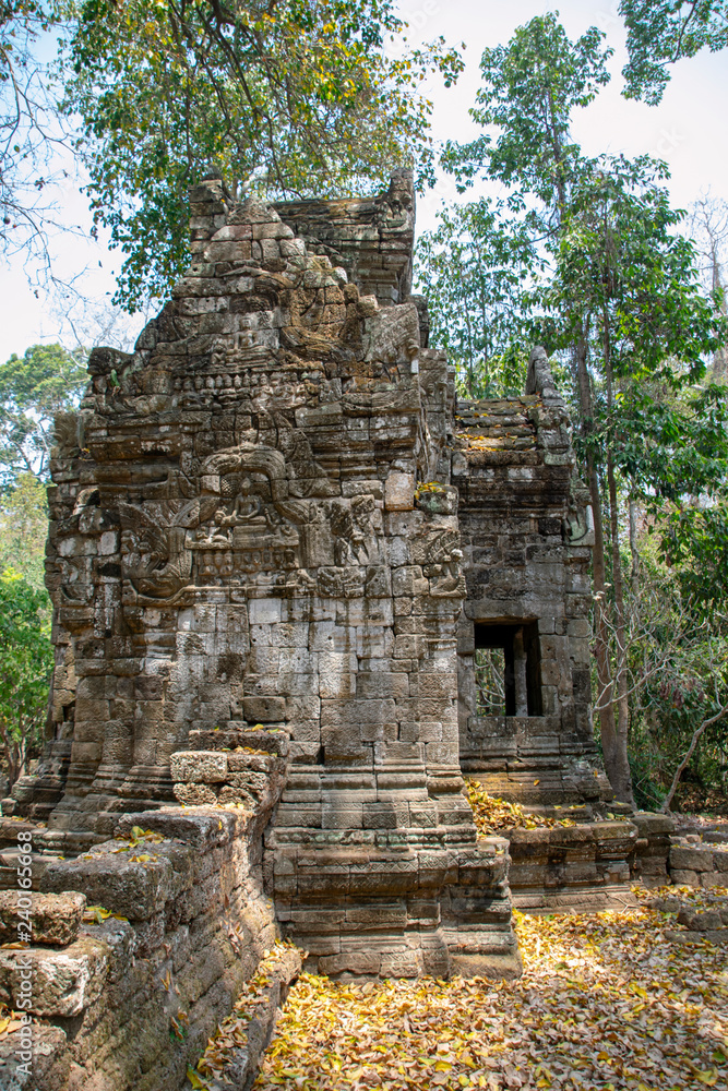Minor structures in the  gardens around the  Baphuon temple mountain. reconstructed by archaeologists over 16 years following the khmer rouge conflict