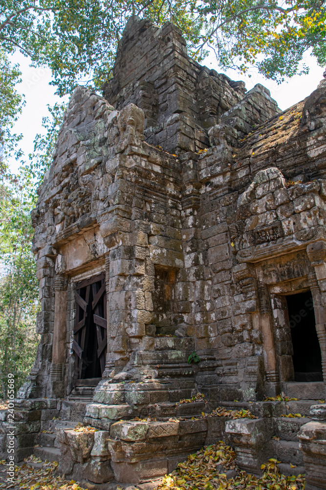 Minor structures in the  gardens around the  Baphuon temple mountain. reconstructed by archaeologists over 16 years following the khmer rouge conflict