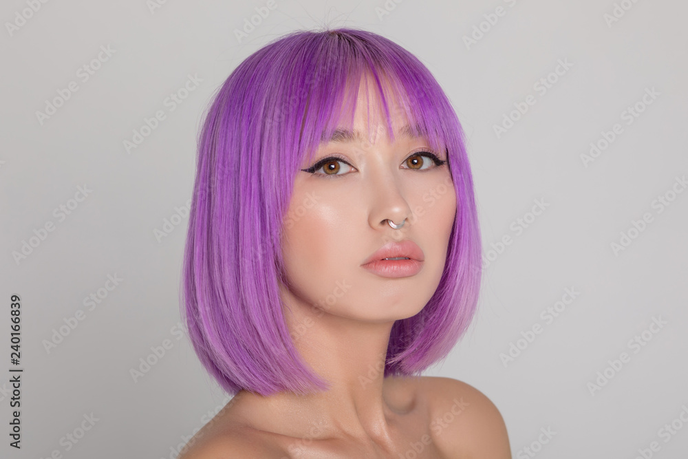 Portrait of beautiful sexy girl with trendy make-up and bright hair. Portrait of beautiful sexy girl with trendy make-up and bright hair.