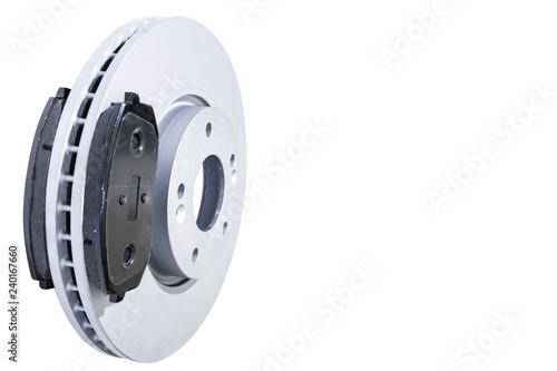 Car Brake discs and brake pads isolated on white background. Auto parts. Brake disc rotor isolated on white. Braking disk. Car part. Car detailing. Spare parts