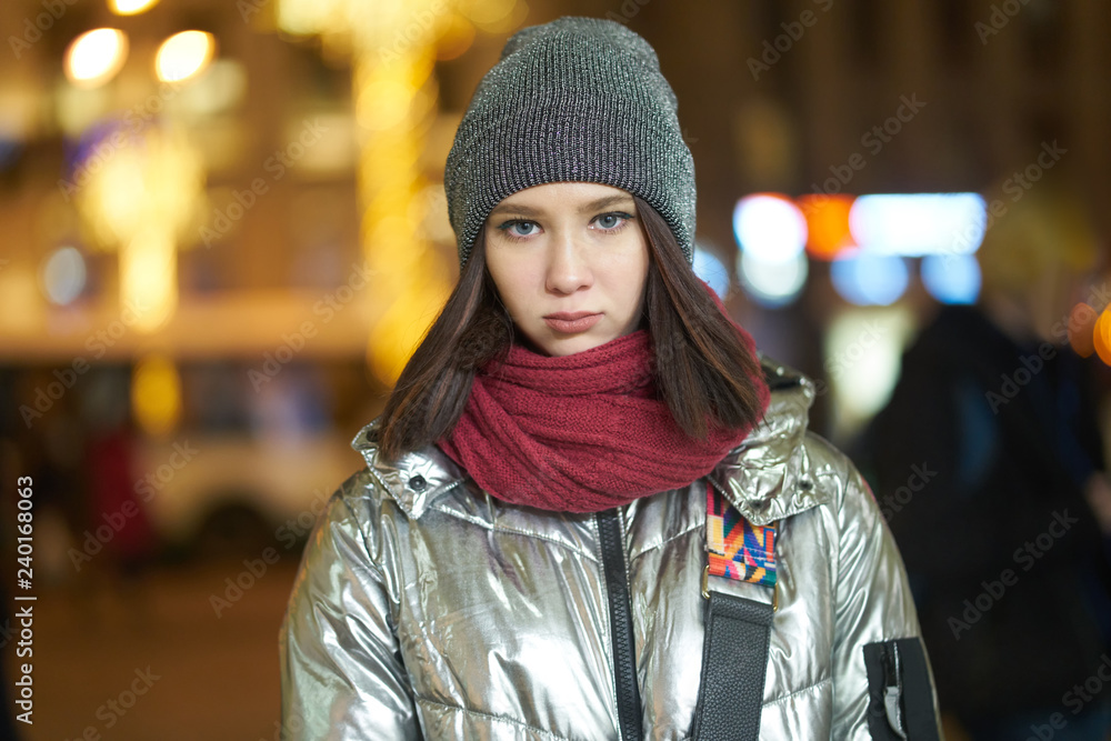 girl in a shiny metallic jacket, portrait in the evening city girl in a shiny metallic jacket, portrait in the evening city