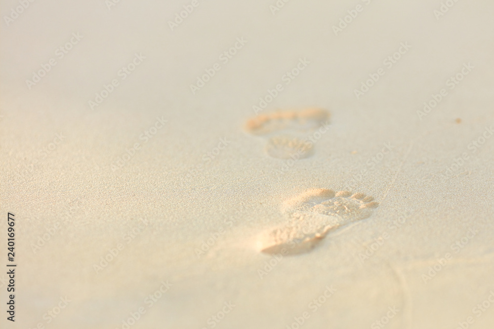 Footprints in the sand - summer vacation Footprints in the sand - summer vacation
