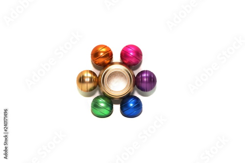 Metallic fidget spiner isolated on white background photo