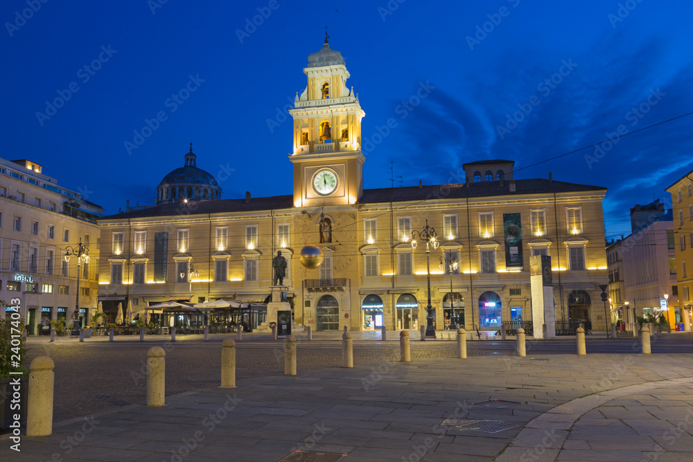 PARMA, ITALY - APRIL 18, 2018: The palace Palazzo del Governatore -  Governor's palace at Piazza Garibaldi at dusk.