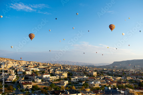 Aerial view on hot air balloons flying over Cappadocia, Goreme. Most famous and popular place in turkey 