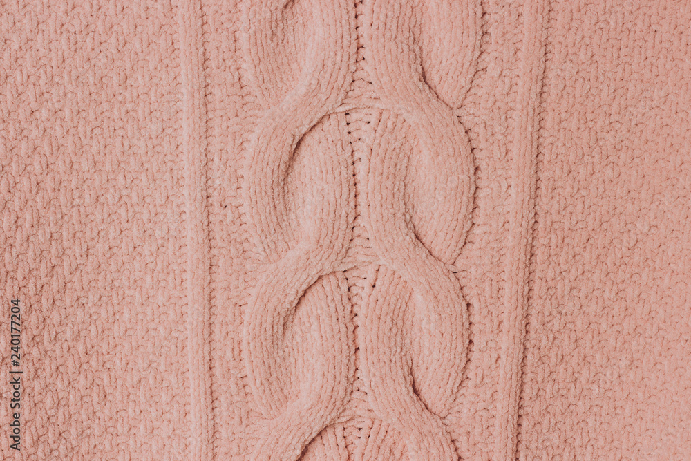 Closeup of white woolen winter sweater texture Closeup of white woolen winter sweater texture