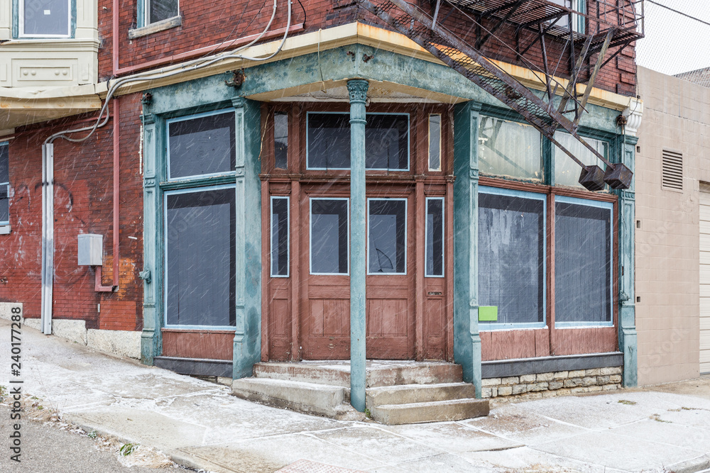 Corner entrance to an abandoned vintage building
