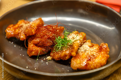 Breaded teriyaki chicken. A dish of Japanese cuisine.