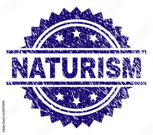 NATURISM stamp seal watermark with distress style. Blue vector rubber print of NATURISM caption with scratched texture.