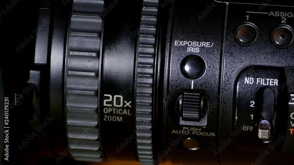 Professional Video Camera lens zoom and focus close-up Professional Video Camera lens zoom and focus close-up