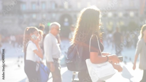 Blurred people walking on piazza del duomo in Milan Italy