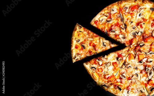 .tasty fresh italian pizza, black background.