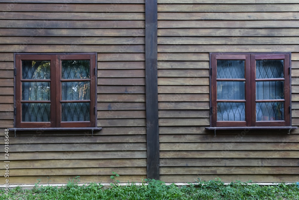 Two wooden window on wood wall background. Texture vintage for interior. Two wooden window on wood wall background. Texture vintage for interior.