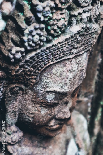 stone carving of ancient face