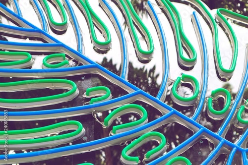 blue and green reflective neon leaf