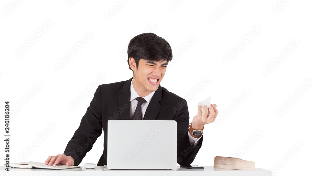 A handsome businessman crunched report with displeased emotion face. A young CEO furious with mistake report. Business man hand crunching a piece of white paper in anger on white background. A handsome businessman crunched report with displeased emotion face. A young CEO furious with mistake report. Business man hand crunching a piece of white paper in anger on white background.