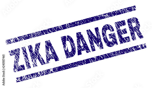 ZIKA DANGER seal print with distress style. Blue vector rubber print of ZIKA DANGER tag with unclean texture. Text tag is placed between parallel lines.