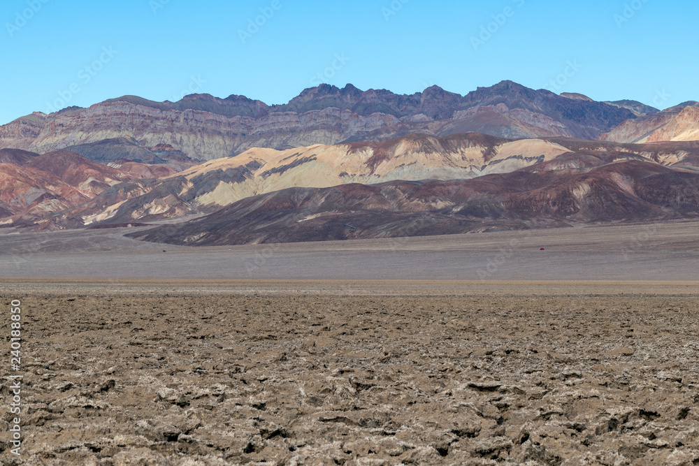 The Devil's Golf Course and adjacent mountains in Death Valley National Park, California, USA