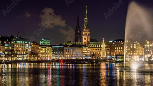 The Inner Alster Lake (German: Binnenalster) in Hamburg, Germany. 4k UHD time lapse video of the inner city and the town hall (German: Rathaus) at night.